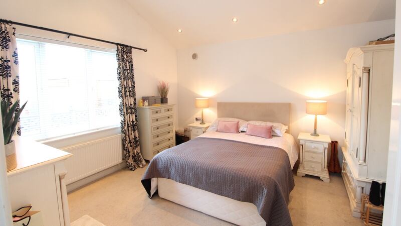 One of the three double bedrooms at number 21