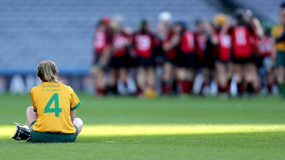 Mullagh’s Ciara Donohue is left dejected at the end the game as Oulart-The-Ballagh celebrate