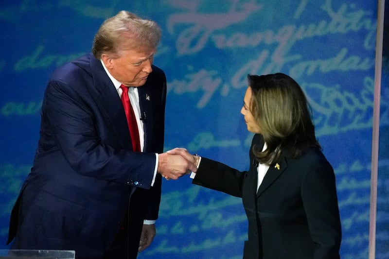 Donald Trump shakes hands with vice-president Kamala Harris. Photograph: Alex Brandon/AP