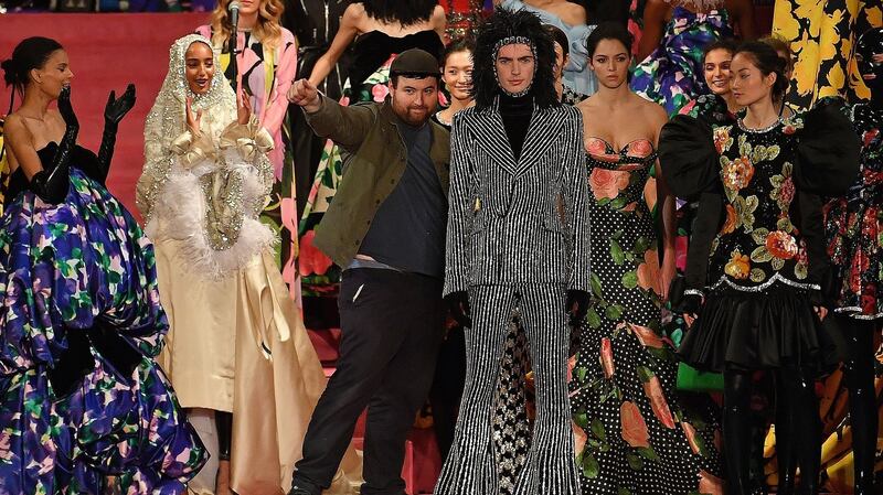 British fashion designer Richard Quinn (centre left) poses with his models after presenting his catwalk show for the Autumn/Winter 2020 collection on the second day of London Fashion Week in London on Saturday. Photograph: Ben Stansall/AFP/Getty Images