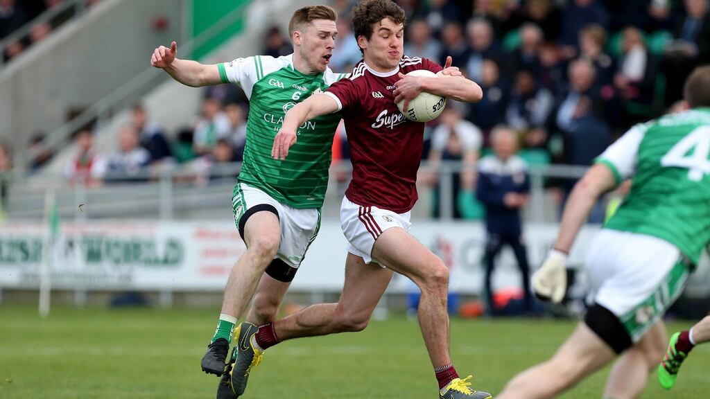 London’s Michael Clarke puts pressure on Galway’s Michael Daly during their Connacht Championship clash in Ruislip. Photograph: Gerry McManus/Inpho
