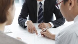 Bank disputes agent’s fee