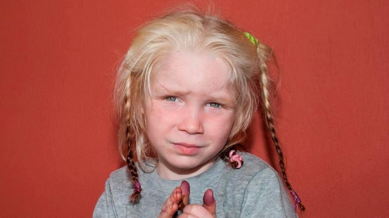 The blonde, blue-eyed girl has sparked worldwide interest after being found living with a Roma couple in Greece. Photograph: Greek Police/Reuters