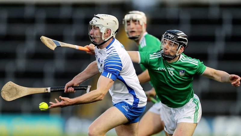 Waterford’s Shane McNulty is challenged by  Graeme Mulcahy of Limerick during the Munster SHC Final at  Semple Stadium. Photograph: Laszlo Geczo/Inpho