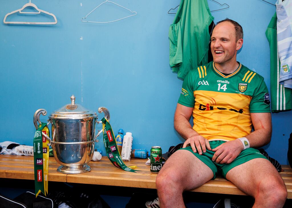 Michael Murphy celebrates in the dressing room with the Anglo Celt Cup after Donegal's win over Armagh in the Ulster Senior Football final. Photograph: Ben Brady/Inpho