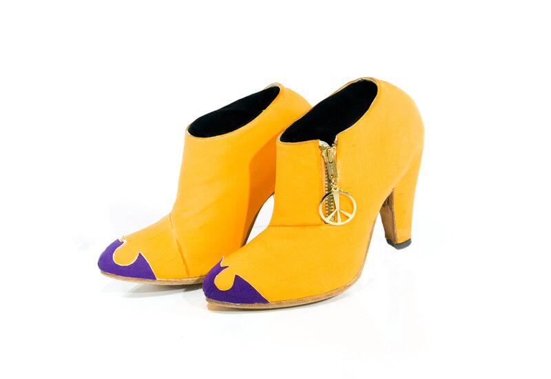 Prince wore boots in Batman or, like these, Joker colours after the release of his Batman soundtrack in 1989. Photograph: Tony Sylvers/© 1985-2021 The Estate of Prince Rogers Nelson. All rights reserved