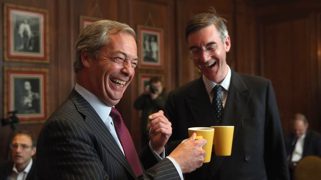 Nigel Farage and Jacob Rees-Mogg. “Folks, we’ve heard it all before,” Mr Farage said after the Bank of England governor said a chaotic EU exit could plunge Britain into its worst economic slump since the second World War. File photograph: Dan Kitwood/Getty Images