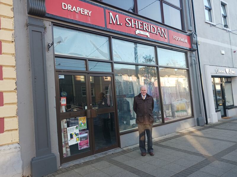 Pat Sheridan outside his shop