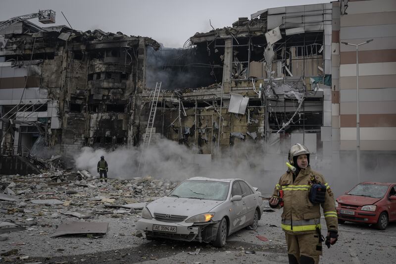 Emergency workers at the site on Friday of a Russian air strike on Dnipro that Ukrainian officials said killed six people and injured about 28. Photograph: Ozge Elif Kizil/Anadolu via Getty Images