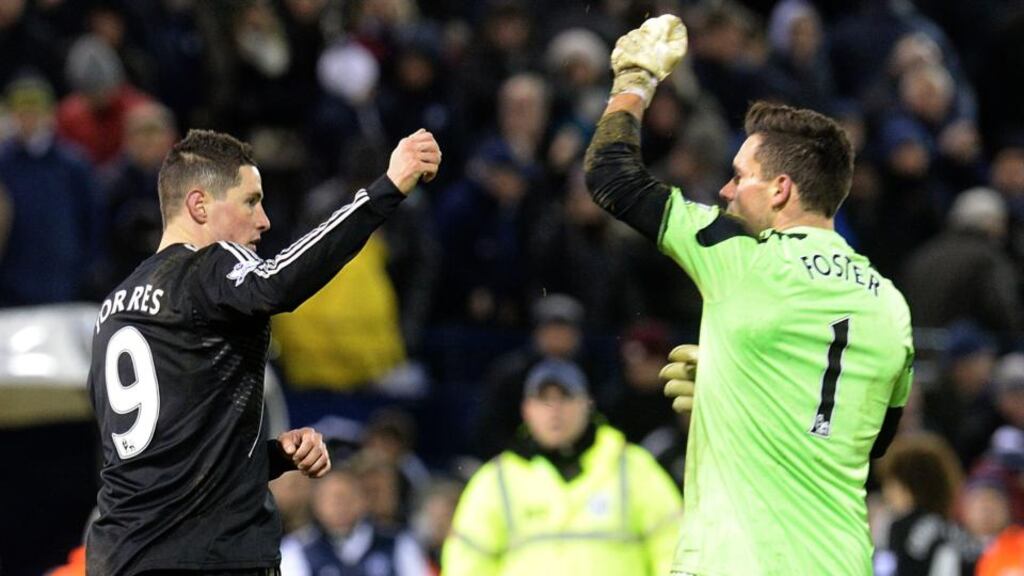Chelsea’s Fernando Torres (left) and West Bromwich Albion goalkeeper Ben Foster have a dispute after the final whistle. Photograph: Martin Rickett/PA Wire.