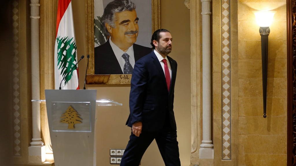 Lebanon’s prime minister Saad al-Hariri leaves after a news conference in Beirut on Tuesday. Photograph: Mohamed Azakir/Reuters