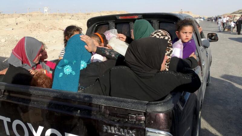 Sunni people flee the violence in the city of Ramadi. Photograph: Reuters