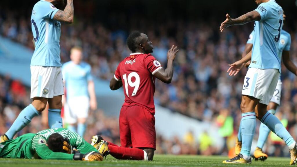 Sadio Mane was sent off for a challenge on Manchester City goalkeeper Ederson as Liverpool were beaten 5-0 at the Etihad. Photograph: Nigel Roddis/EPA