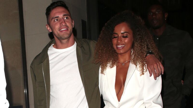 Love Island winners Greg O’Shea and Amber Gill seen on a night out at The Ivy Soho Brasserie in London in August 2019. Photograph: Ricky Vigil/GC Images