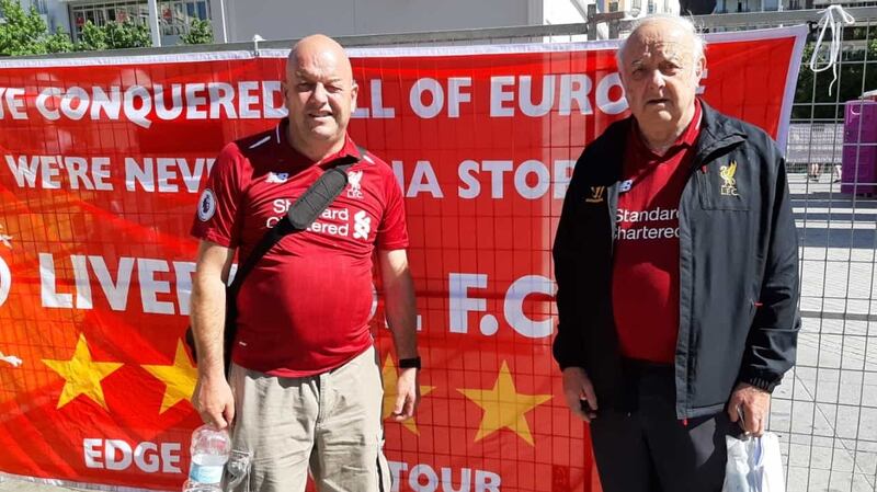 John Holmes (right) with his son John.