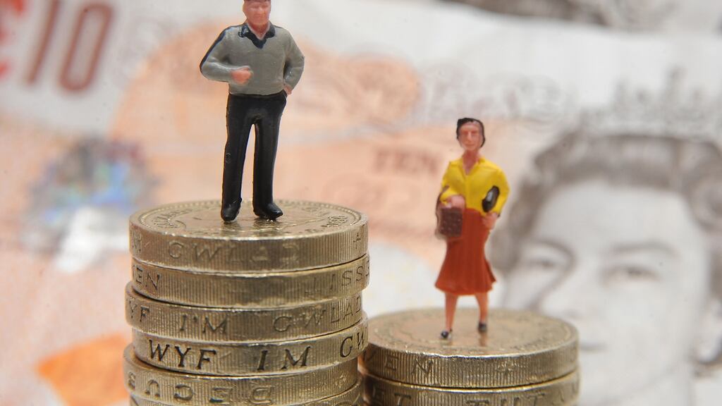 Gender pay gap  measures the difference between the earnings of all men and women across an entire organisation, and is expressed by calculating women’s pay as a percentage of men’s. Photograph:  Joe Giddens/PA