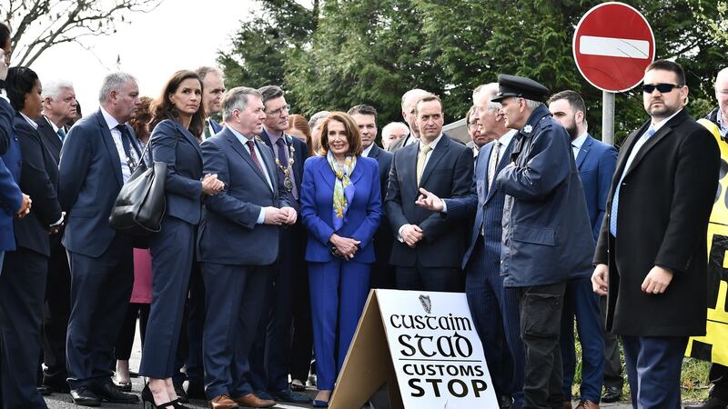 US House of Representatives speaker Nancy Pelosi (centre) stands at a mock customs checkpoint manned by a member of the Border Communities Against Brexit group. Photograph: Getty