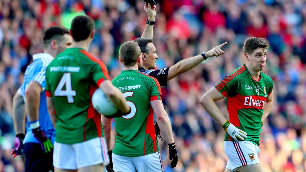 Mayo’s Lee Keegan is black carded by referee Maurice Deegan in the All-Ireland football final replay. Photograph: James Crombie/Inpho