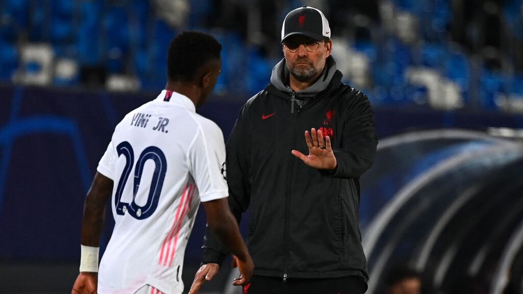 Jurgen Klopp gestures at Real Madrid’s Brazilian forward Vinicius Junior during the first leg in Madrid. “You don’t get a comeback because you had a comeback in the past. You only have a chance if you play really good football in the present.” Photograph: Gabriel Bouys/AFP/Getty Images