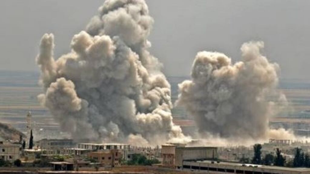 Smoke rising during the Syrian government forces’ bombardment of the town of Khan Sheikhun in Idlib province. Photograph: Getty Images