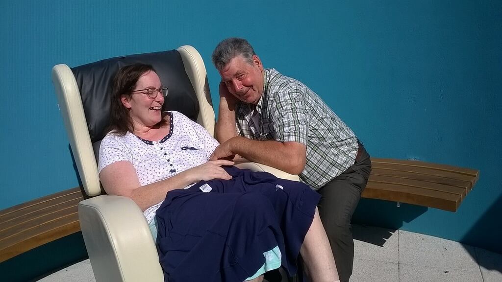 Wendy Flynn with her father Hughie Stapleton after she was injured in a horse-riding incident.