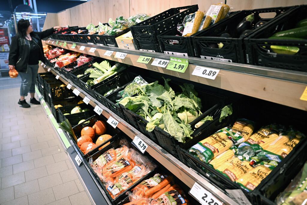 A woman chooses products from the fruit and vegetable counter at a store in Berlin earlier this month. German inflation slowed in July and the ECB believes that it may have peaked across the euro zone. Photograph: Ina Fassbender/AFP via Getty Images