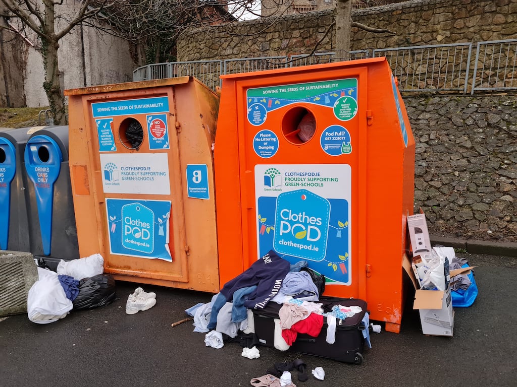 Items left next to full-to-capacity clothes banks in Dundrum, Dublin on Friday February 14th. Photograph: Joe Humphreys