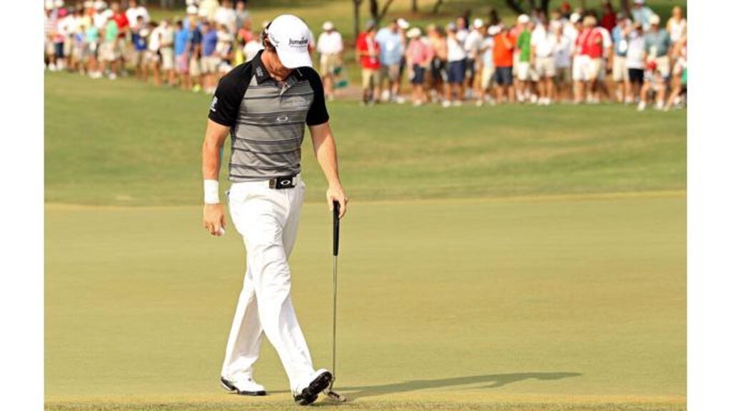Rory McIlroy walks off the first green following a double bogey. McIlroy would finish on seven over for the tournament after a third round 74. Photo by Andrew Redington/Getty Images