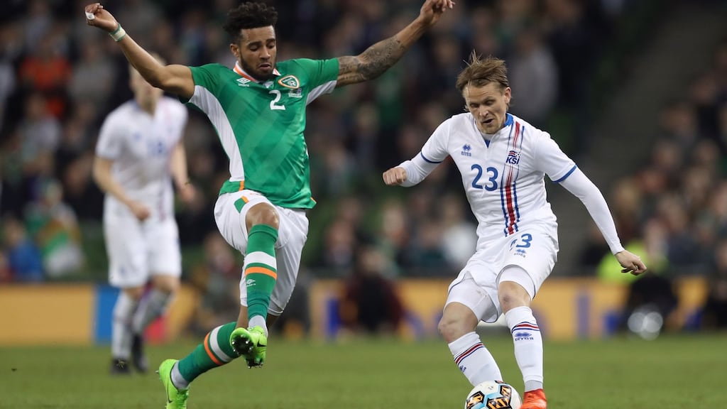 Republic of Ireland full back  Cyrus Christie closes down Iceland’s Ari Skulason during the friendly international  match at the Aviva Stadium. Photograph:  Brian Lawless/PA Wire