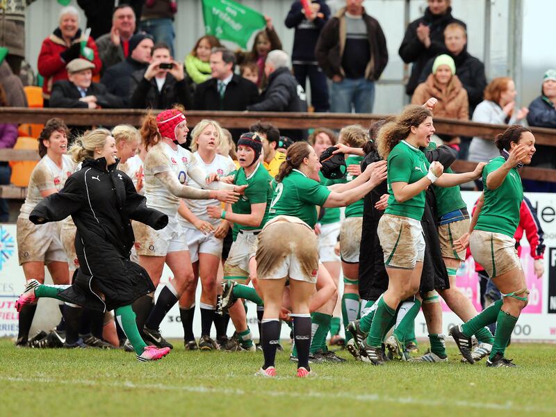 The Irish players celebrate at the final whistle after the victory over England at Ashbourne. Photograph: Dan Sheridan/Inpho