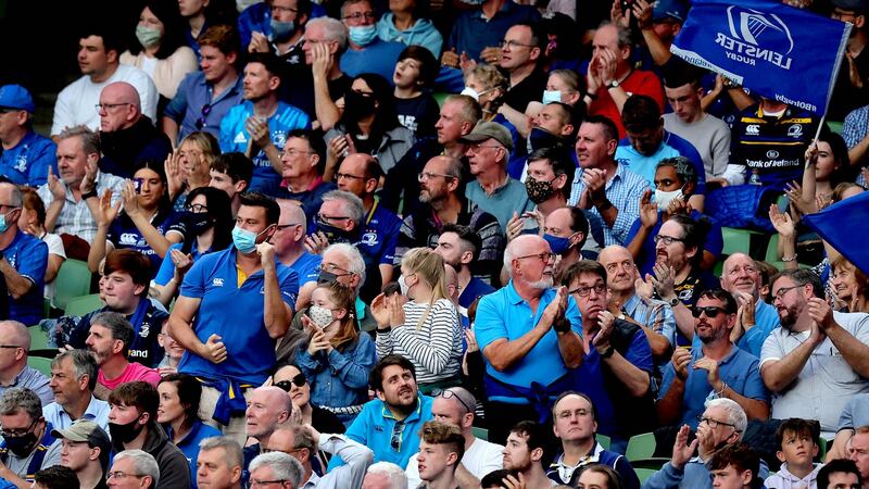 Leinster fans celebrate a try during the United Rugby Championship game against the Vodafone Bulls at the Aviva Stadium. Photograph: Ryan Byrne/Inpho