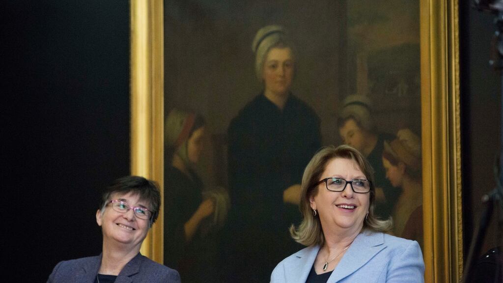 Sr Mary Deane  with Dr Mary McAleese beneath a portrait of Nano Nagle pictured at the official opening of Nano Nagle Place in Cork City on Monday, December 18th, 2017. Photograph: Clare Keogh