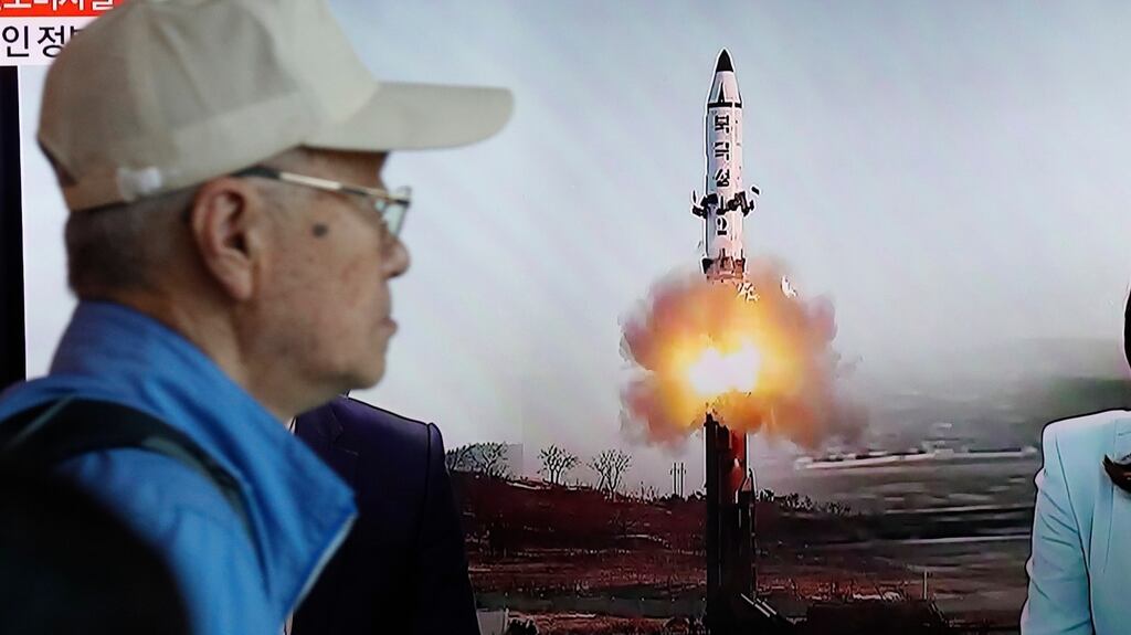 A South Korean man watches a television report on North Korea’s ballistic missile launch on Sunday, its first military provocation since South Korean president Moon Jae-in took office on May 10th. Jeon Heon-Kyun/EPA