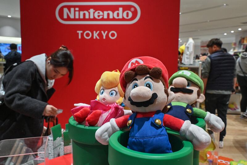 Customers at Japanese gaming giant Nintendo's official store in Tokyo's Shibuya district. Photograph: Richard A Brooks/AFP via Getty Images