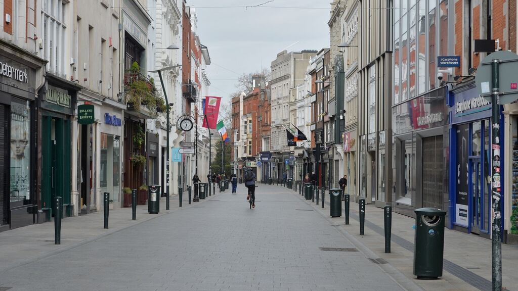 Dublin’s Grafton Street devoid of people as coronavirus restrictions remain in place. Photograph: Alan Betson