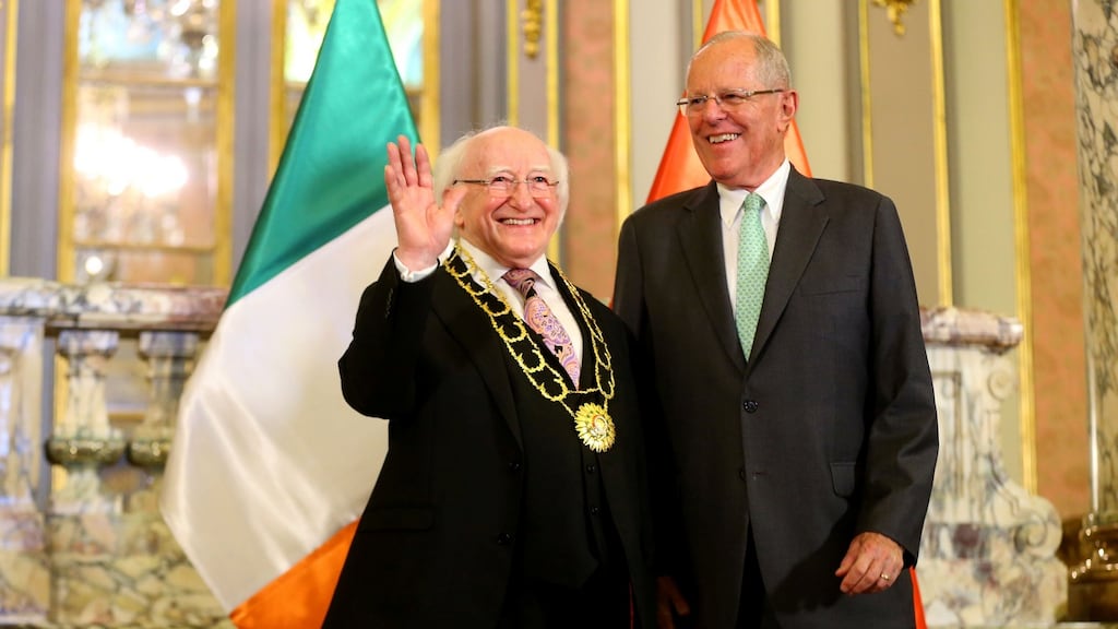 President Michael D. Higgins waves after being decorated with the Order of the Sun by Peru’s president Pedro Pablo Kuczynski at the Presidential Palace in Lima, Peru on Friday. Photograph: Reuters