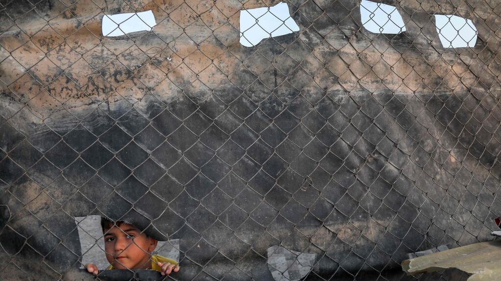 A boy at the Bahrka refugee camp, 10km west of Arbil, in the autonomous Kurdistan region of Iraq. Photograph: Safin Hamed/AFP via Getty