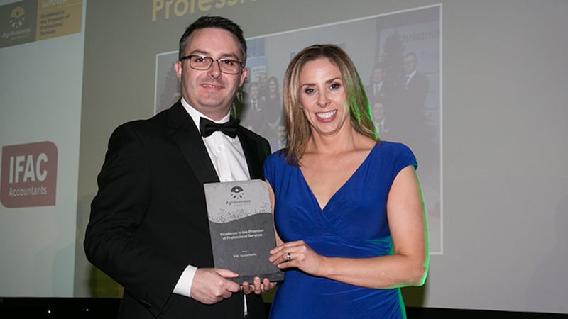 Dr. Karina Pierce, Lecturer, School of Agriculture and Food Science, UCD and Judging Co-ordinator, presents the Excellence in the Provision of Professional Services to John Donoghue, IFAC Accountants