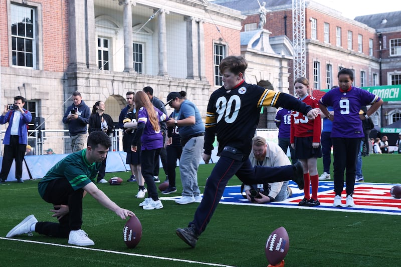 Fans kick field goals at the NFL Experience in Dublin Castle. Photograph: Ian Walton/NFL