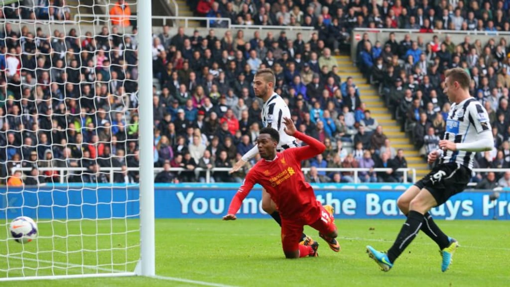 Daniel Sturridge of Liverpool heads home their second goal during the Premier League match against between Newcastle United at St James’ Park. Photograph: Julian Finney/Getty Images