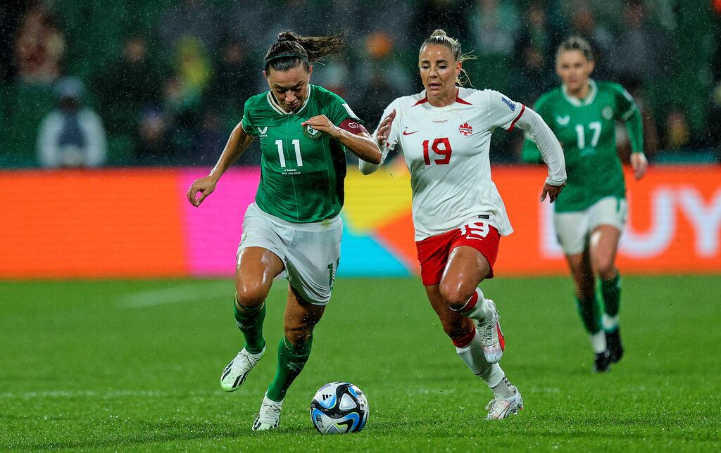 Ireland’s Katie McCabe with Adriana Leon of Canada. Photograph: Ryan Byrne/Inpho