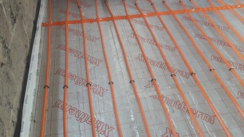 Blocked up fireplace and underfloor heating in Sarah Cassidy’s Dublin home