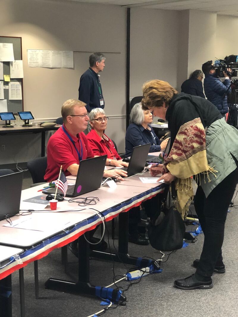 Early voters in the US midterm elections cast their ballots in Fairfax County, Virginia. Photograph: Suzanne Lynch