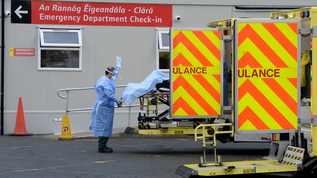 A patient being brought to a Covid emergency department. Levels of infections among healthcare workers are up to six times higher than in the community, with significant levels of undiagnosed infection among asymptomatic staff. Photograph: Alan Betson