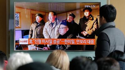 People in Seoul, South Korea watch a TV news programme showing North Korean leader Kim Jong Un. Photograph: Ahn Young-joon/AP