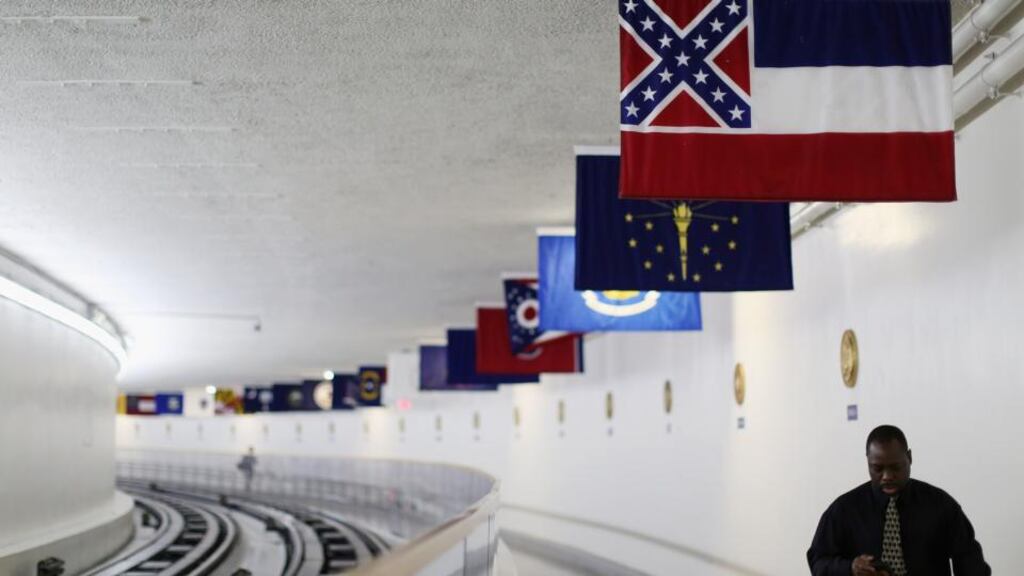 The state flag of Mississippi, which incorporates the Confederate flag , is displayed with the flags of the other 49 states and territories in the tunnel connecting the senate office building and the US Congress. Photograph: Chip Somodevilla/Getty