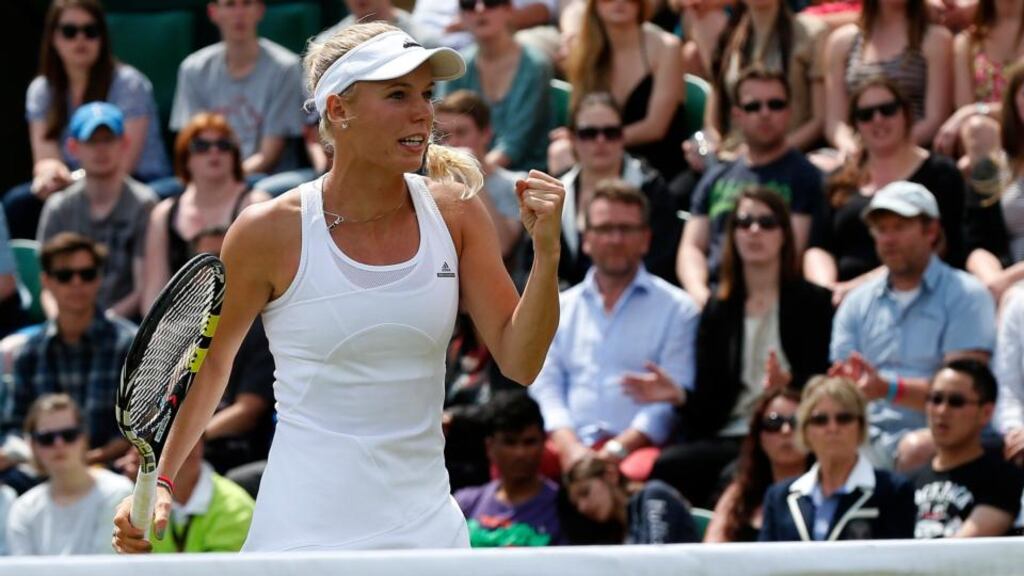 Caroline Wozniacki of Denmark reacts after breaking serve during her women’s singles match against Ana Konjuh of Croatia. Photo: Suzanne Plunkett/Reuters