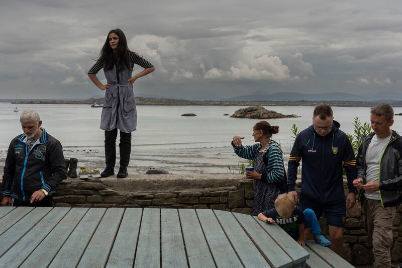 Sebastian Sebo, second from right, manages the hostel on Arranmore that is hosting refugees. Photograph: Paulo Nunes dos Santos/New York Times