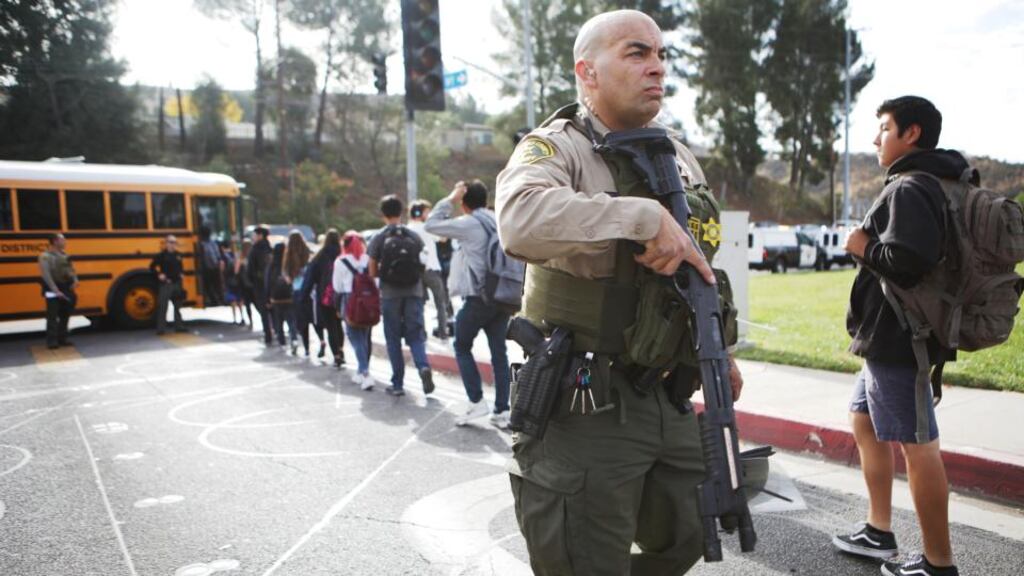 Students are evacuated from Saugus High School onto a school bus after a shooting at the school left two students dead and three wounded on Thursday in Santa Clarita, California. Photograph: Mario Tama/Getty