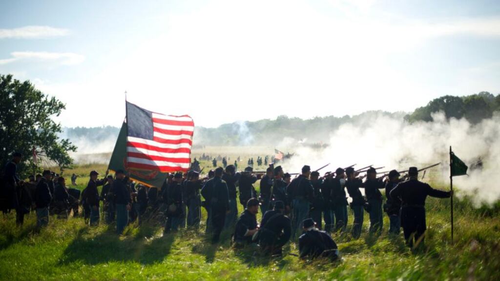 Participants play the role of Union troops during a battle of the wheat field re-enactment for the Battle of Gettysburg’s 150th anniversary in Gettysburg, Pennsylvania on July 5th. Photograph: Mark Makela/The New York Times